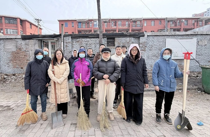 践行雷锋精神 海州区人民检察院到育才社区开展清扫活动